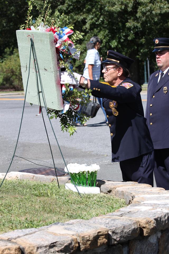 Flower placed for Thomas Simpson by Socky Trojahan

Memorial Service NFD. September 9, 2012. Photo by Vincent P. Tuzzolino